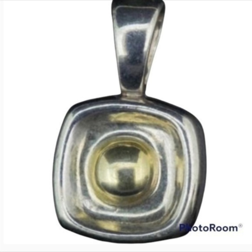 Silpada pendant hangs on sterling silver chain